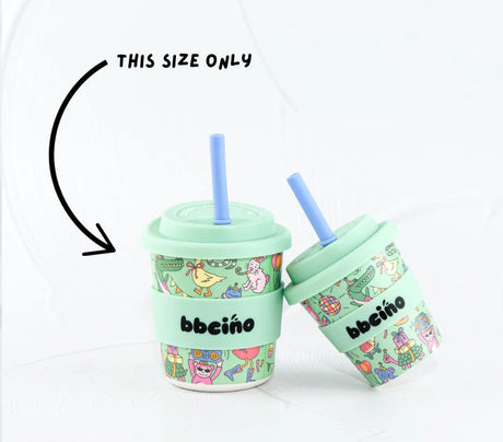 Two mint green cups with colorful designs and blue straws on a white background.