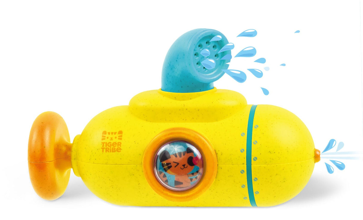 Yellow toy submarine with water spray feature on a white background
